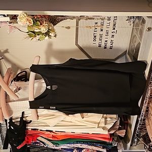 Women's black sleeveless blouse with sheer detail